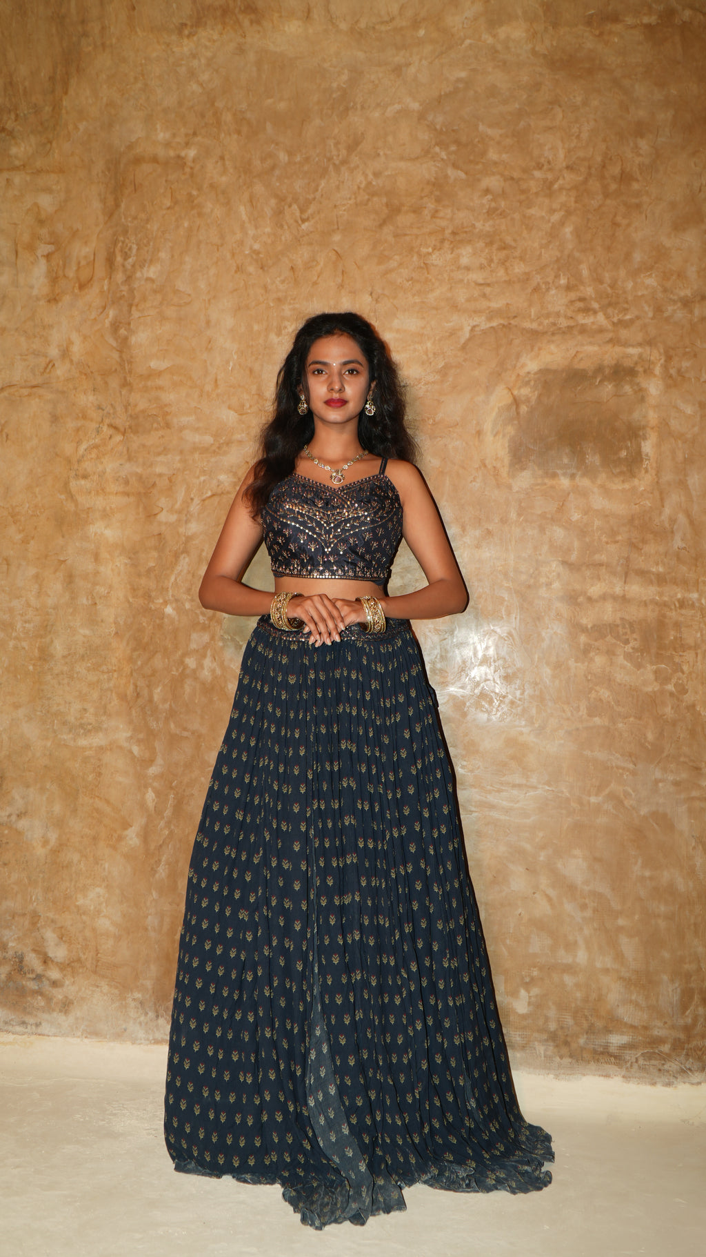 Navy sprig gathering lehenga with floating panel and blush tinted hand embroidered bodice with coat