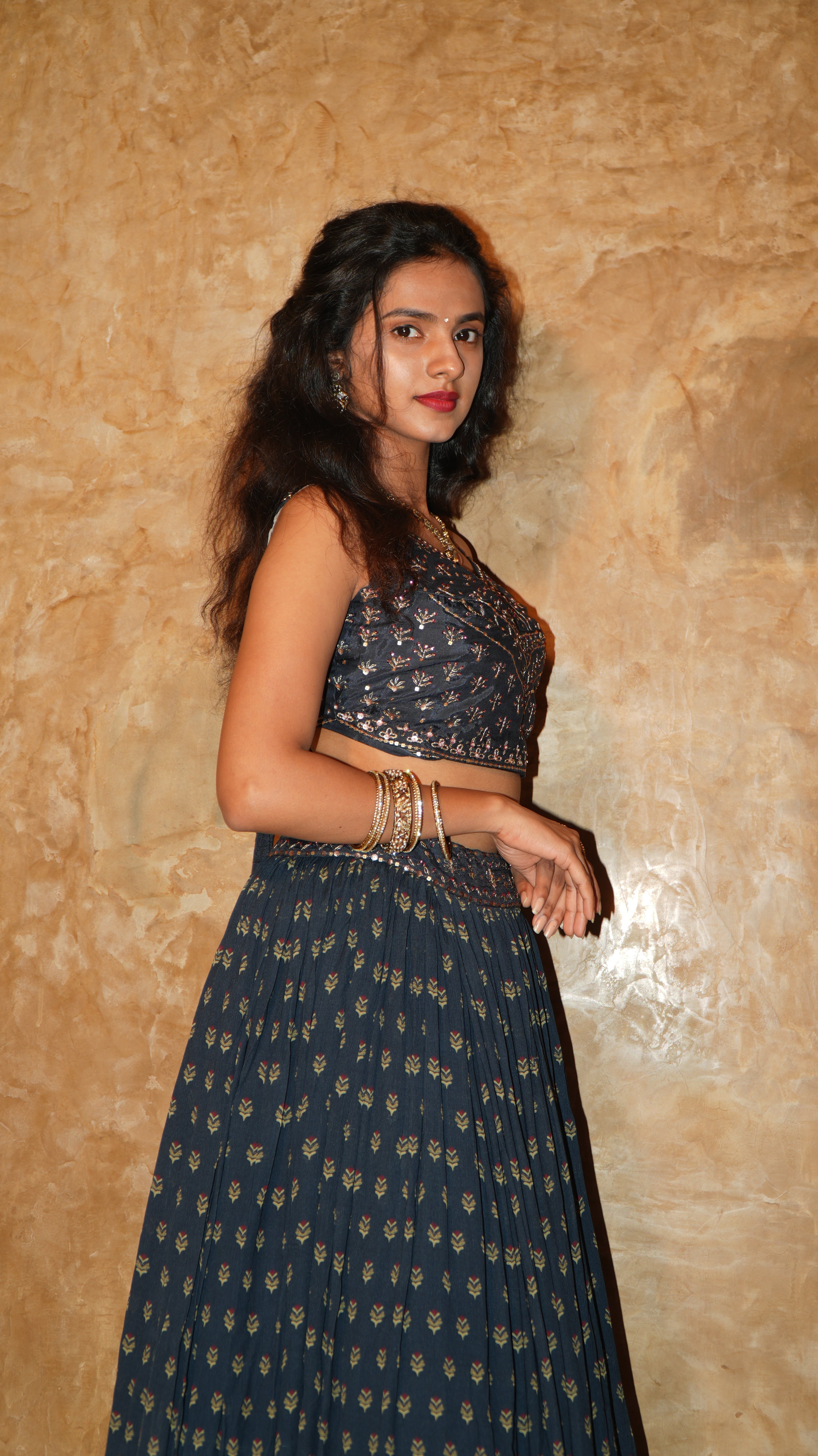 Navy sprig gathering lehenga with floating panel and blush tinted hand embroidered bodice with coat