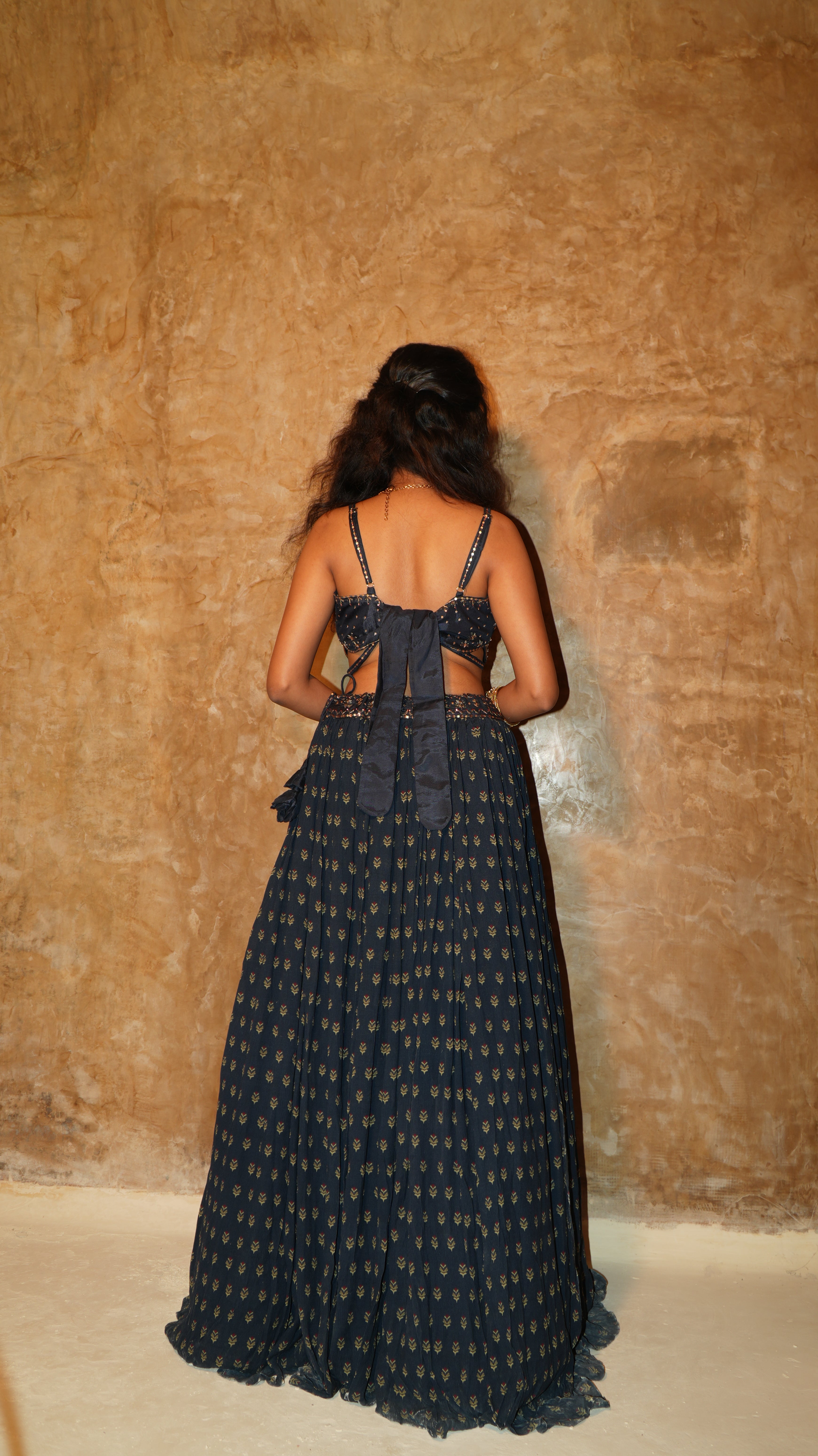 Navy sprig gathering lehenga with floating panel and blush tinted hand embroidered bodice with coat